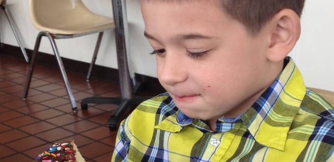 Grady is enjoying his donut!